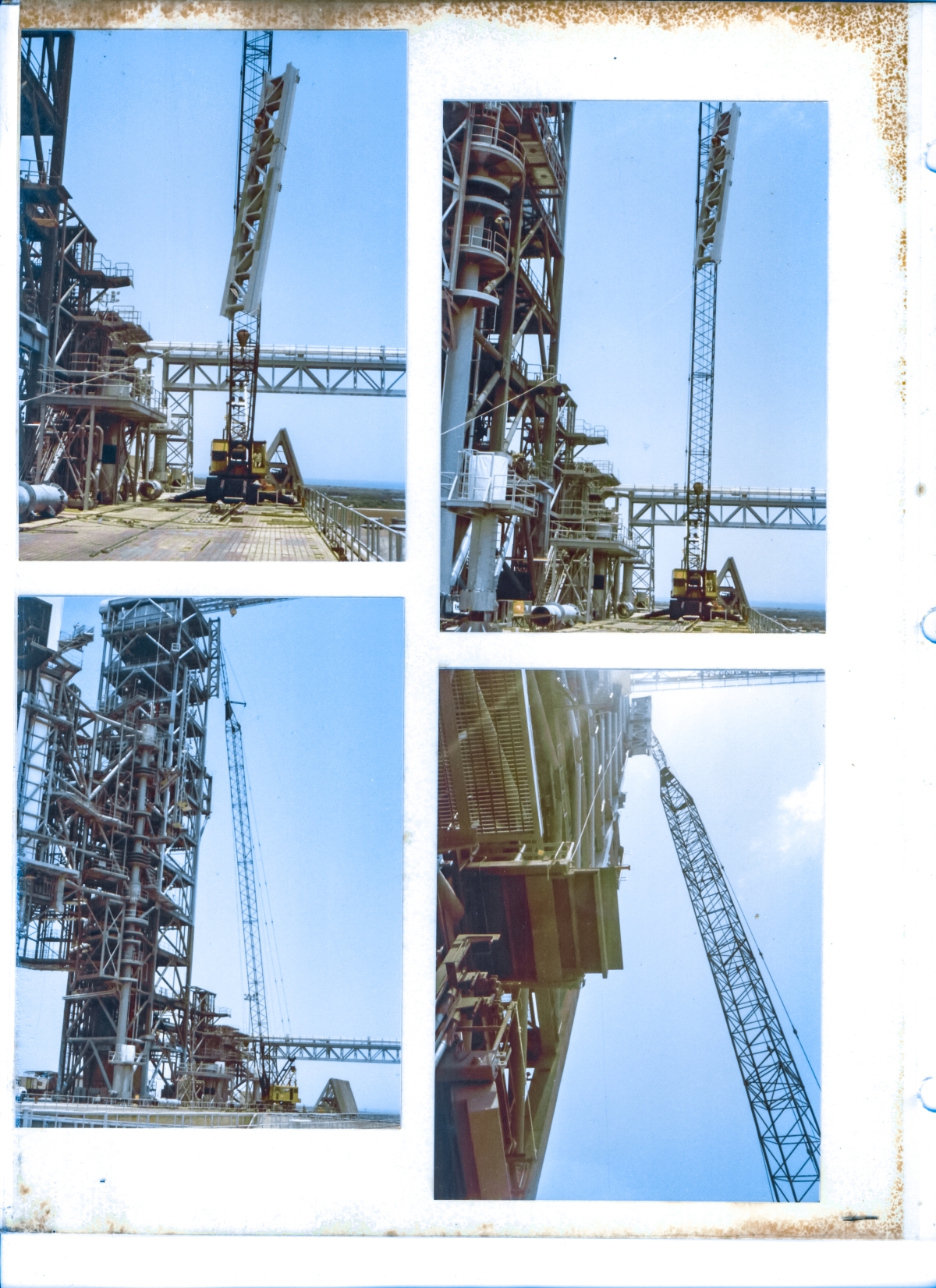 The Gox Arm support strongback travels skyward to the top of the FSS, where it will be bolted and welded to the tower, at Launch Complex 39-B, Kennedy Space Center, Florida.